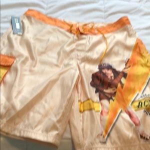 AC/DC board shorts long. Size 36 waist never worn